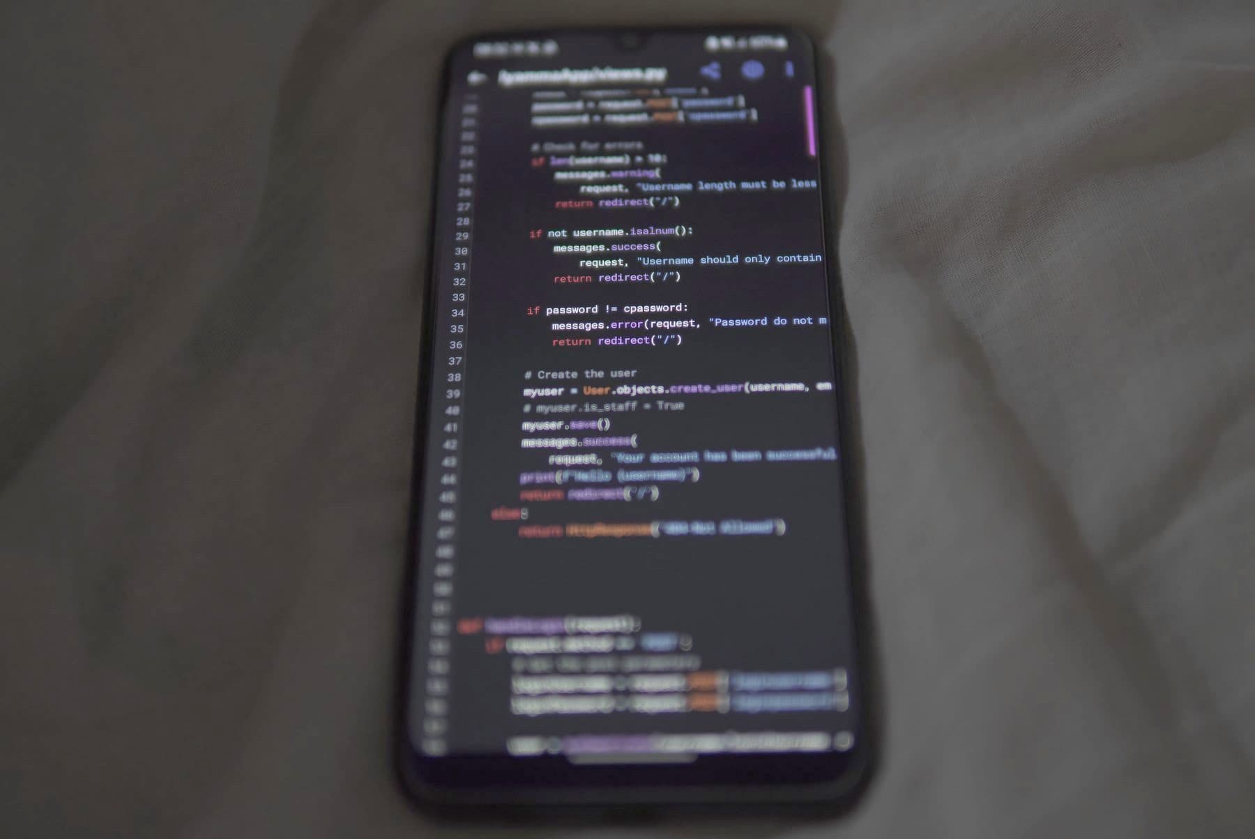 Code displayed on a smartphone screen